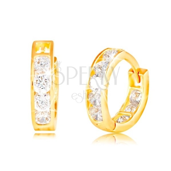 Yellow 14K gold earrings with hinged snap - circles, imbedded sparkling clear zircons
