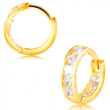 Yellow 14K gold earrings with hinged snap - circles, imbedded sparkling clear zircons
