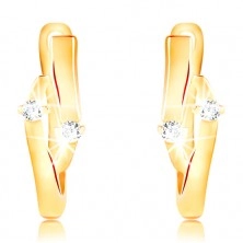 Earrings made of yellow 14K gold - grain with an indent and two clear zircons