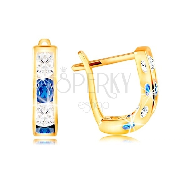 Earrings made of yellow 14K gold - arch of clear and blue zircons