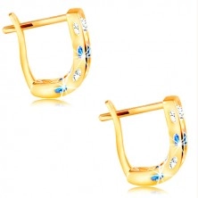 Earrings made of yellow 14K gold - arch of clear and blue zircons