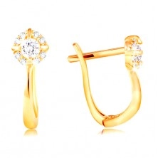 Yellow 585 gold earrings - sparkling zircon flower in clear colour