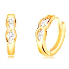 14K gold earrings with hinged snap fastening - two oval cuts with clear zircons