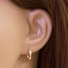 Earrings made of yellow 14K gold - thin ovals with shiny smooth surface