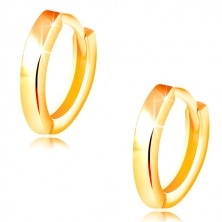 Earrings made of yellow 14K gold - thin ovals with shiny smooth surface