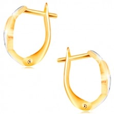 585 gold earrings - shiny wavy lines decorated with cuts and white gold
