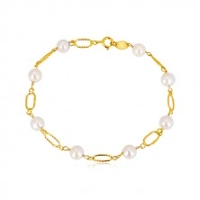 585 gold bracelet - white rounded pearls, oval rings with notches