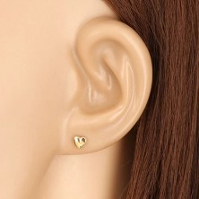 9K yellow gold earrings - glossy asymmetric heart, stud fastening