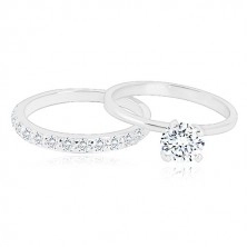 Set of silver rings - a wedding ring with with a glittery half, ring with a zircon