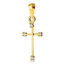 Yellow 14K gold pendant - cross with narrow shoulders and clear zircons