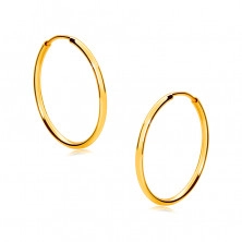 Round golden earrings in 9K gold – thin rounded shoulders, glossy surface, 17 mm
