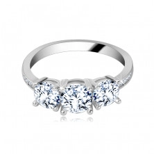 925 Silver ring- three shimmering clear zircons, narrow shiny shoulders adorned with zircons