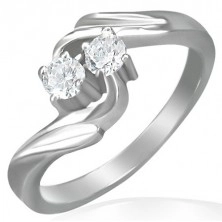 Engagement ring- twisted center, two zircons