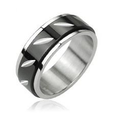Steel ring with rotatable black center - cut-outs