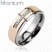 Ring made of titanium in pink gold colour and line of zircon