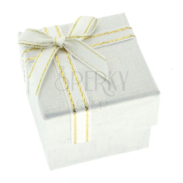 White gift box with Greek pattern and ribbon