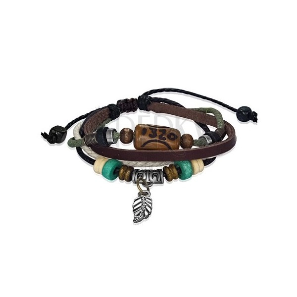 Leather bracelet with Bali bead, feather and wooden beads