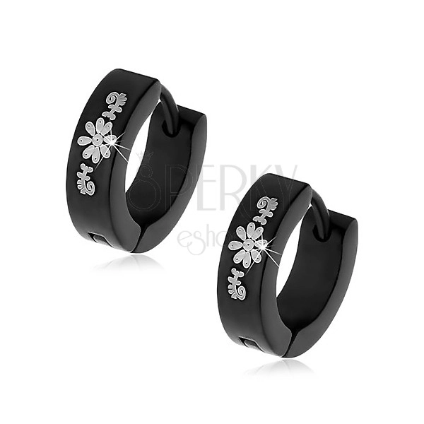 Black huggie earrings made of surgical steel with floral pattern