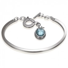 Bracelet made of surgical steel, incomplete oval with dangling blue zircon