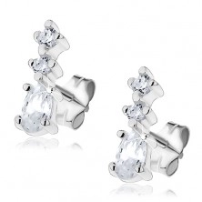 Silver stud earrings - row of three glimmering zircons